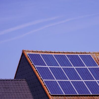 Free Solar Panels on House Roof Stock Photo